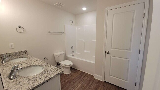 Building Photo - Coming Soon!!!  "Spacious 4-Bedroom Retrea...