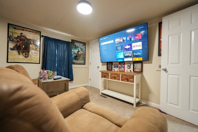 Building Photo - Cozy Fully Furnished 2-Bed with a Movie Ro...