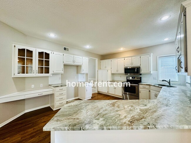 Building Photo - Beautifully Renovated Home in Olathe with a Finished Basement!
