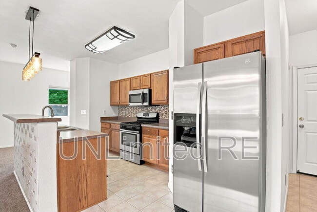 Building Photo - 9132 W Arden Ln