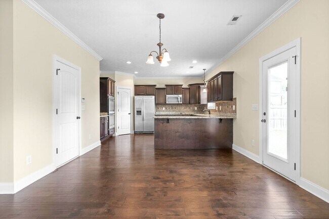 Building Photo - Pet Friendly Four Bedroom with Bonus!