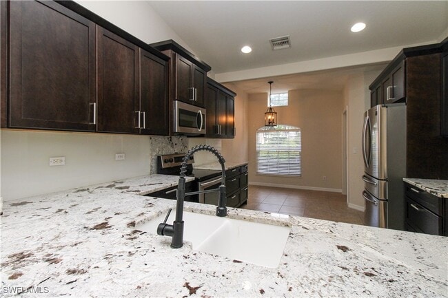 Building Photo - 15077 Cortona Way