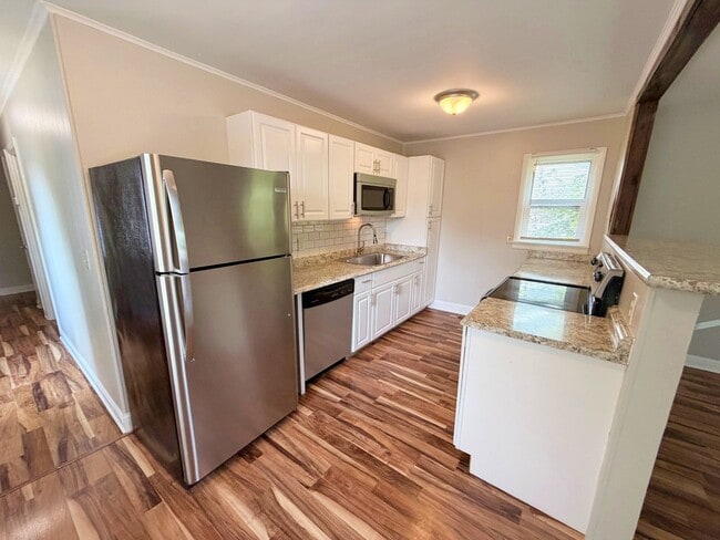 Building Photo - Move-In Ready 3BR Rental with Spacious Yard & Deck