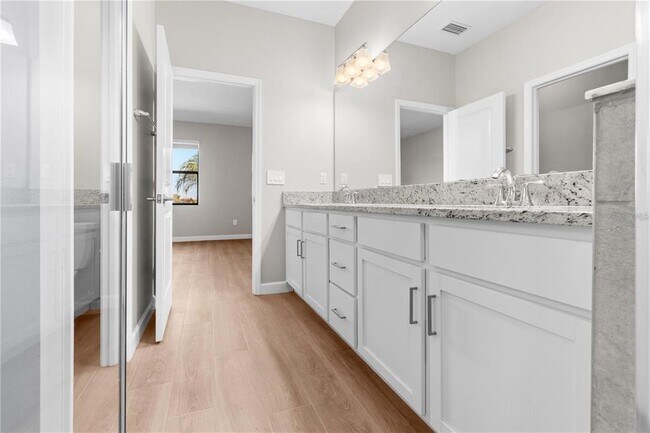 Building Photo - 15719 Islandwalk Ave