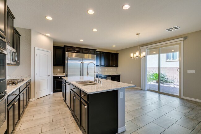 Building Photo - Beautiful Next-Gen Home with Private Entry Suite & Spacious Backyard