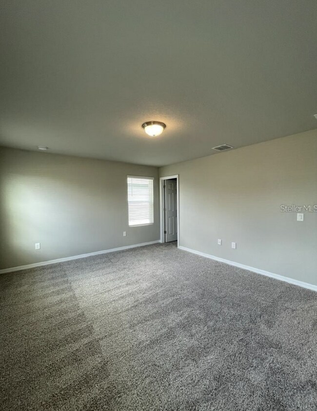 Building Photo - Beautiful corner unit townhouse features an abundance of natural light.