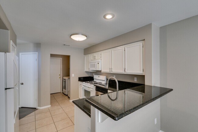 Building Photo - GORGEOUS HOME WITH TONS OF UPGRADES*GATED COMMUNITY WITH A COMMUNITY POOL*