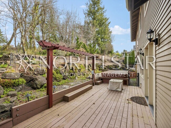 Building Photo - Elevated Forest Heights Retreat with Stunning Valley Views & Versatile Living Spaces