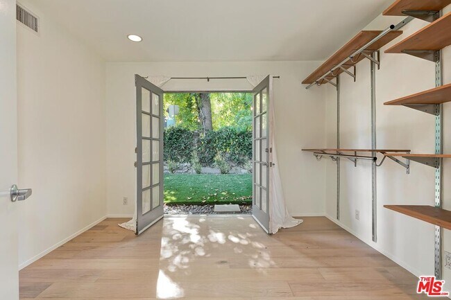 Building Photo - 7586 Woodrow Wilson Dr
