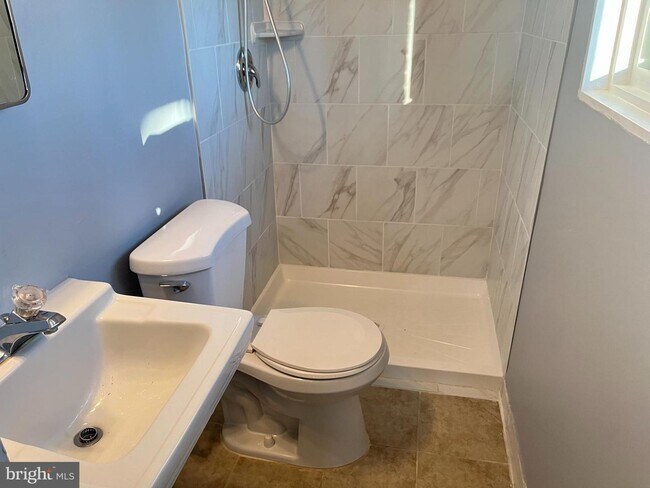 Building Photo - Discover the charm of this exquisite two-level home