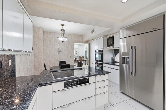 Building Photo - 9801 Collins Ave