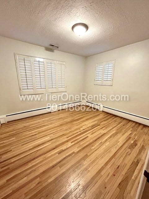 Building Photo - This property offers a NO DEPOSIT option available for qualified renters!