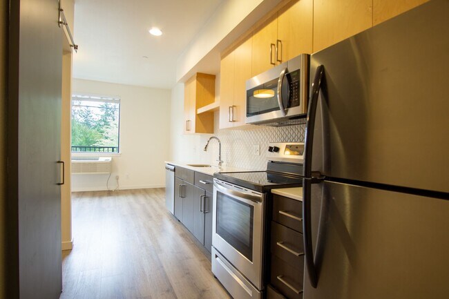 Building Photo - Modern & Chic Corner 1-Bed w/Private Balcony!