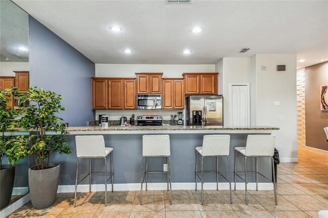 Building Photo - 8841 Candy Palm Rd