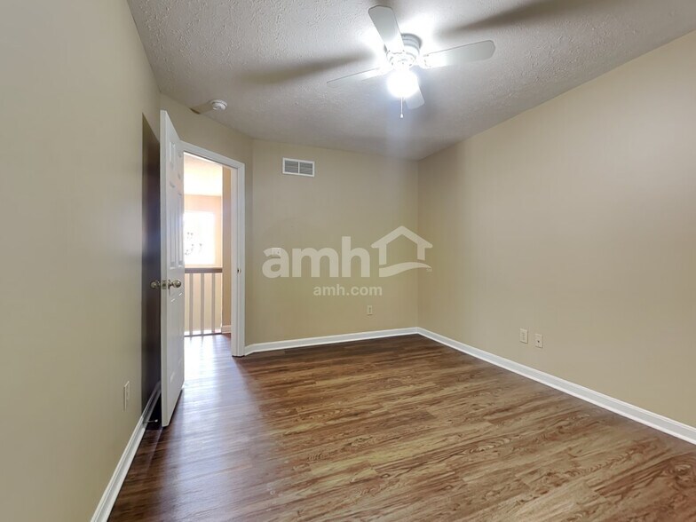 Building Photo - 8676 Woolstone Ct
