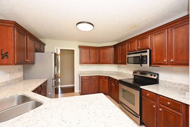 Building Photo - **BEAUTIFUL, WELL-MAINTAINED BRICK HOME ON A LOVELY 0.63-ACRE LOT IN A DESIRABLE NEIGHBORHOOD**