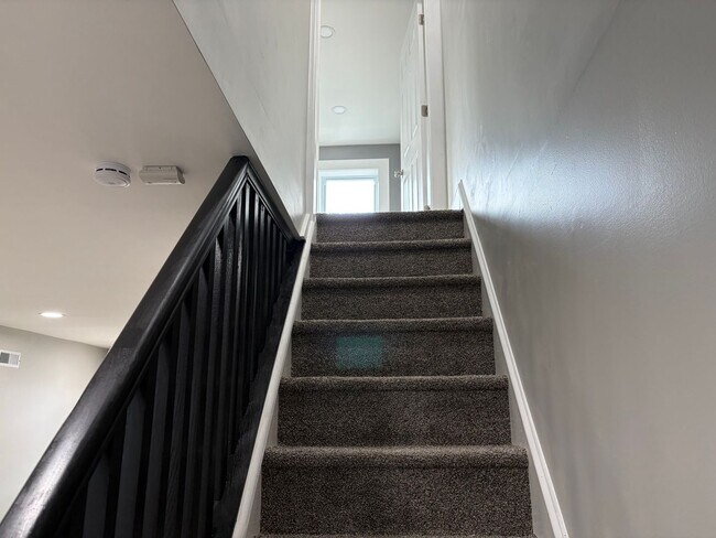 Building Photo - Newly Renovated 2- Story Townhome with Front Porch and Back Yard