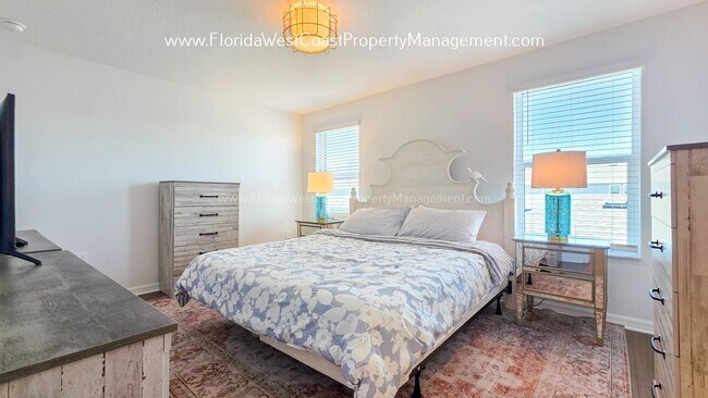 Building Photo - EXCEPTIONAL AND SPACIOUS FURNISHED TOWNHOME WITHIN WATERSIDE- NAUTIQUE!