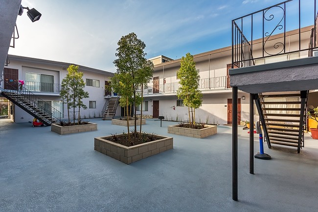 Water-Friendly Landscaped Courtyard - 7240 Bright Avenue - The Villas at Uptown