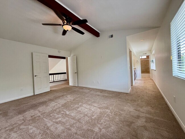 Building Photo - Spacious 4 Bedroom House with Large Fenced Yard! Landscaping Included! Two Car Garage!