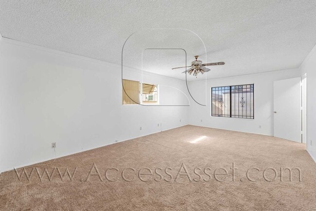 Building Photo - Single-Story 3 Bed with Covered Patio & Gated Yard