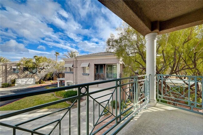 Building Photo - Amazing condominium in gated upscale neigh...