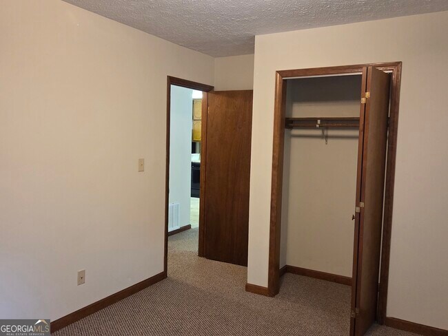 Building Photo - 8437 Pineland Dr
