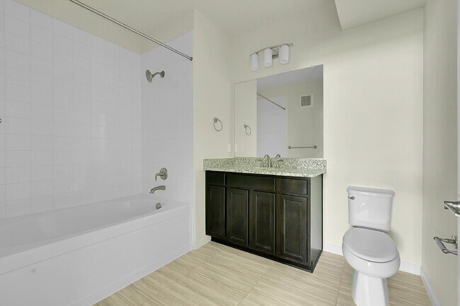 Building Photo - $2,044.95 - 2 Bed, 2 Bath Ground Floor Condo with AC, and In Unit Laundry!