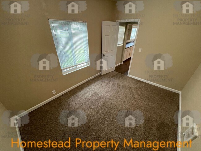 Building Photo - 219-219 1/2 S Monmouth Ave