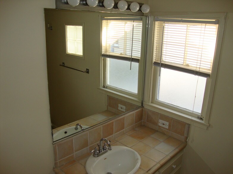 Bathroom sink and side window - 812 Bard St
