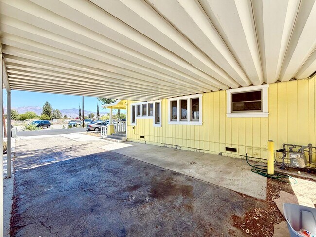 Building Photo - Charming 3 Bedroom Home with Included Landscaping, Spacious Backyard & Carport