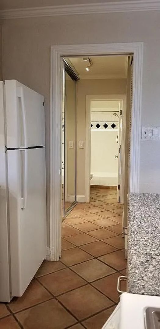 Building Photo - One Bedroom Condo Walking Distance to CU with Fenced Backyard and Flatiron Views!