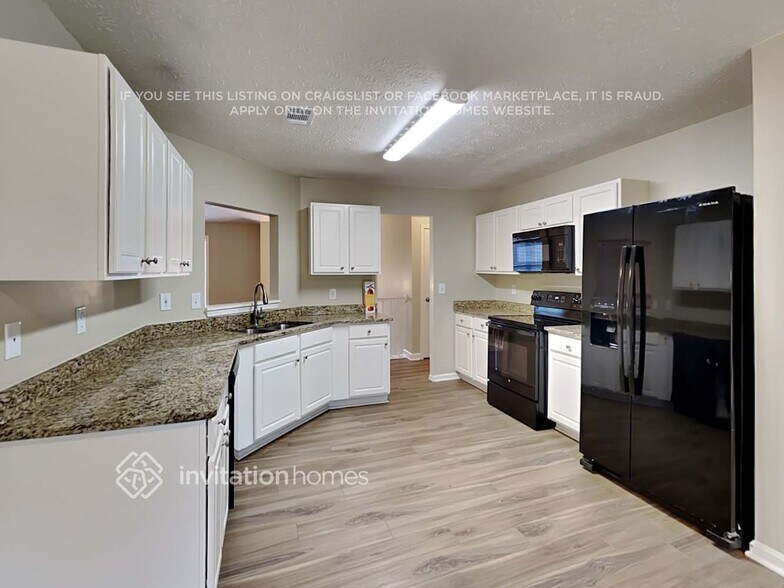 Building Photo - 4950 Promenade Dr SW