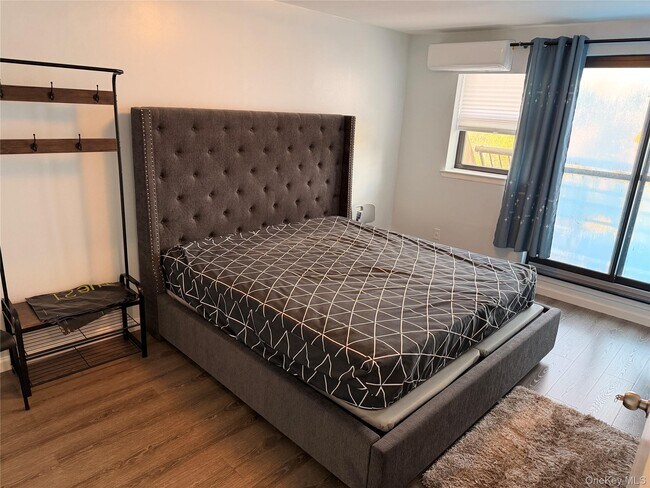 Building Photo - 55-12 Main St