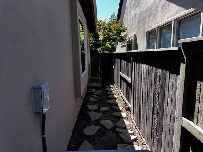 Building Photo - Spacious 3BR, 2BA with Solar and Modern Up...