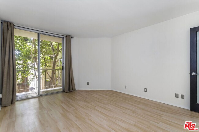 Building Photo - 1230 N Sweetzer Ave