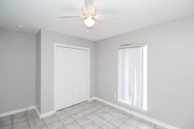 Building Photo - West Pensacola Brick Home with Vaulted Ceilings, Split Floor Plan, Open Living Design & Easy Acce...