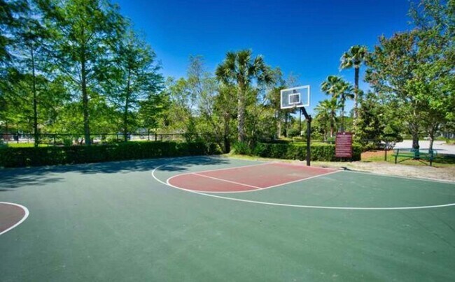 Building Photo - Spacious 3-Bedroom Condo with Pond Views &...