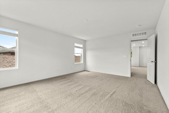 Building Photo - Beautiful 4 Bedroom Home in The Lakes at Centerra | 2,583 Sq. Ft.