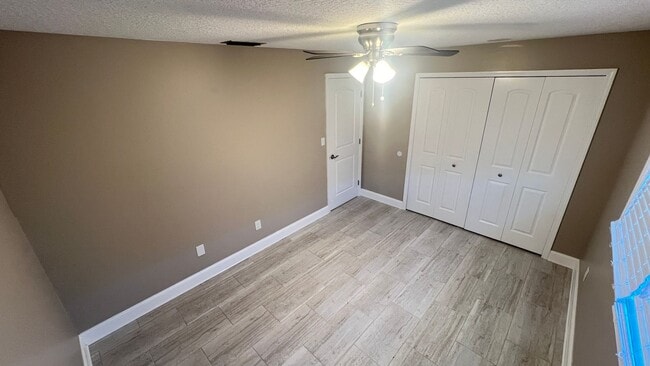 Building Photo - IMMACULATE 4 Bedroom, 2 Bathroom Home in Cocoa Beach!! ONLY MINUTES from the Beach!! (Lawn Care I...