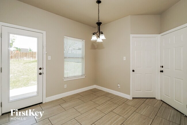 Building Photo - 6630 Woodstock Dr
