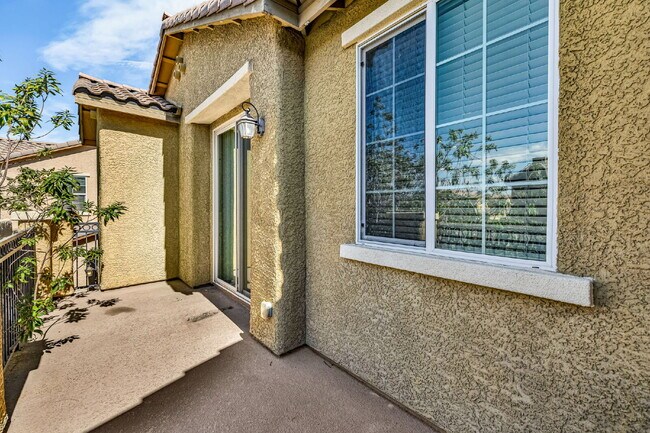 Building Photo - Modern, Guard Gated, and Close to Everything! 3-Bed Townhome Near St. Rose Parkway and Liberty Hi...