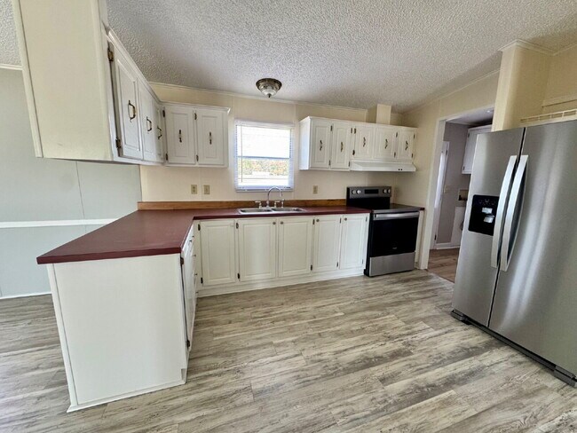 Building Photo - SPACIOUS & IMMACULATE! 3 BR | 2 BA DOUBLEWIDE ON .77 ACRE *MT OLIVE*