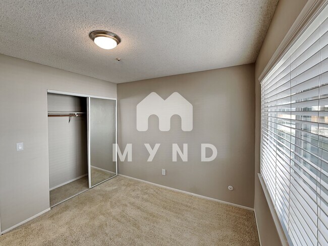 Building Photo - 6500 Country Club Dr Apt 1