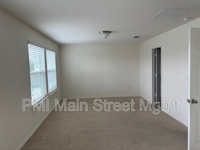 Building Photo - 8130 Red Stopper Ln