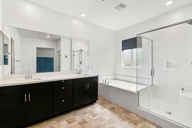 Building Photo - Modern 4-Bedroom Home in Gated Henderson Community | Built 2022