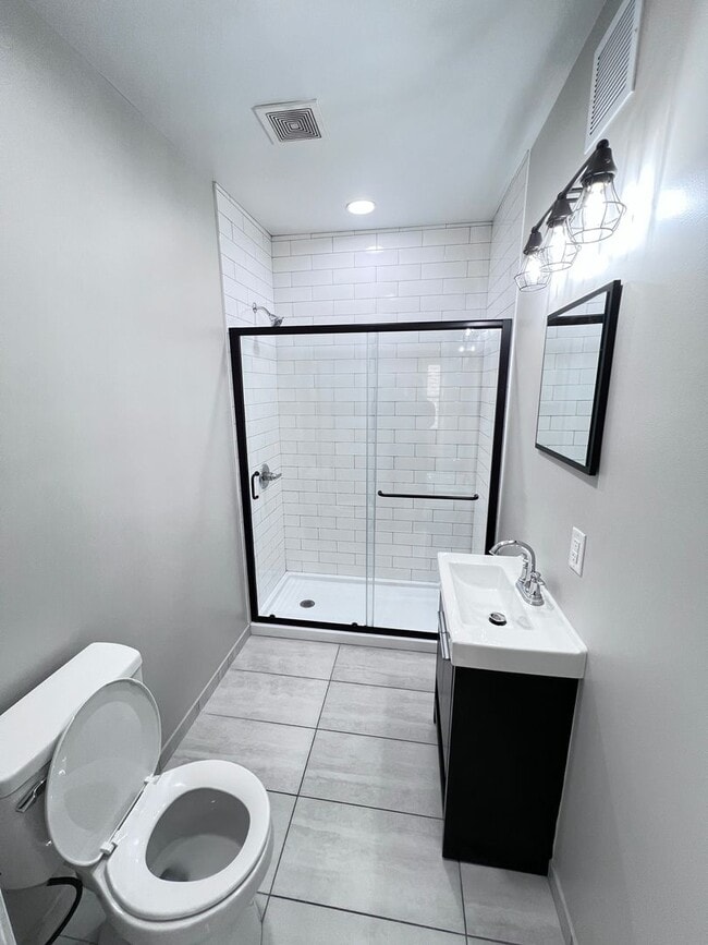 Building Photo - The Duplex on Plumer: Where Modern Meets M...