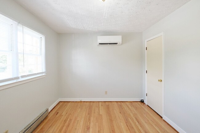 Building Photo - Small Dog-Friendly Woolen Mills Duplex Near Downtown