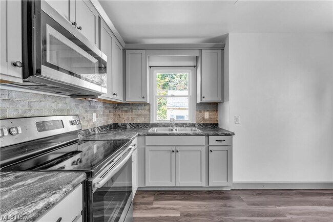Building Photo - 5634 Waterbury Ave