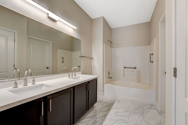 Building Photo - Upgraded First-Floor Condo in a Gated Summ...